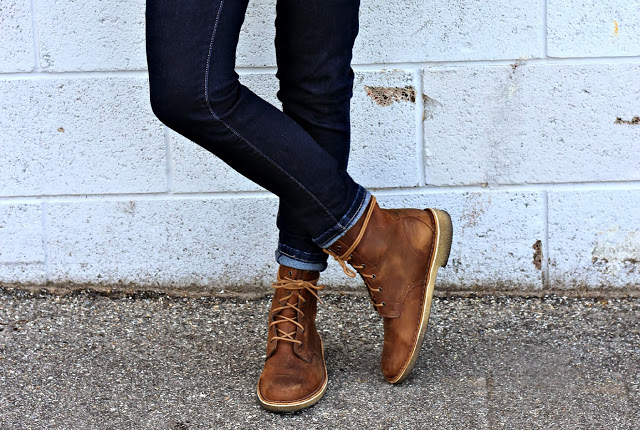 flannel, a quilted vest and clark's desert boots