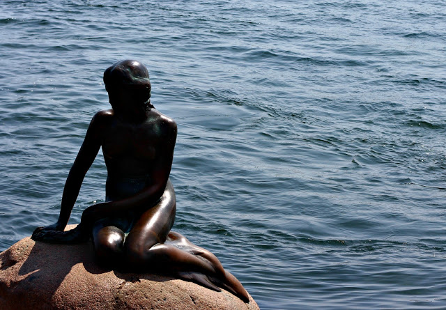 the little mermaid in copenhagen, denmark | touring copehnagen by bike