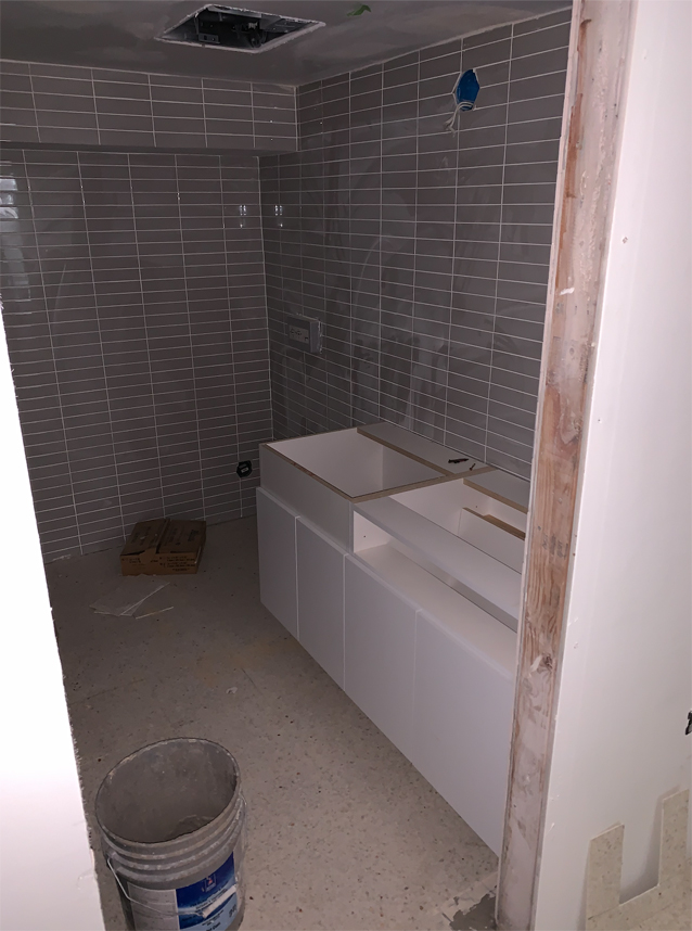 our mid-mod renovation | grey stacked tile via Finding Beautiful Truth